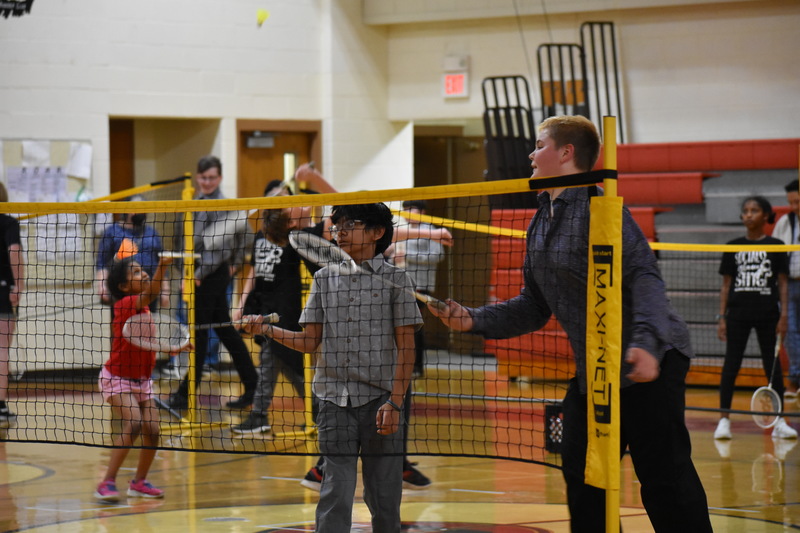 Students play badminton in the large gym during Bengals Night.